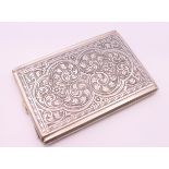 An 800 silver cigarette case. 11.5 x 7.75 cm. 117.6 grammes.