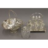 A silver plated egg cruet, a basket and a plate mounted preserve jar.