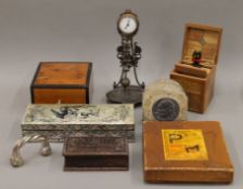A box of miscellaneous items, including various wooden boxes, a silver plated torque, etc.