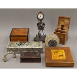 A box of miscellaneous items, including various wooden boxes, a silver plated torque, etc.