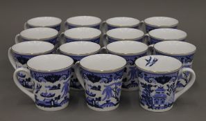 A quantity of Seville Ceramics tea cups.