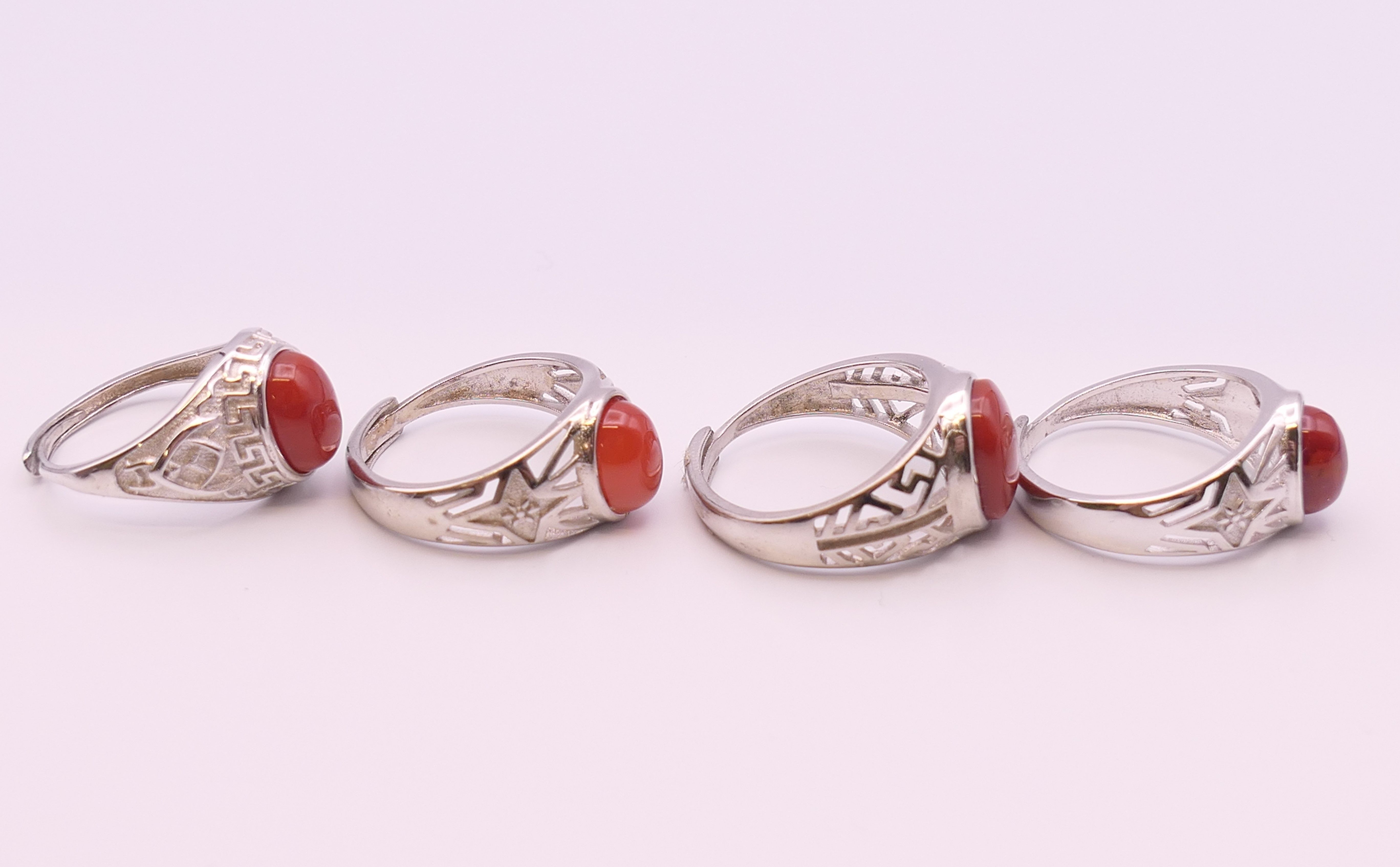 Four silver and coral rings. - Image 2 of 4