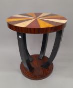 An Art Deco style coffee table. 58.5 cm diameter.