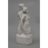 A cast plaster sculpture of two lovers, possibly Adam and Eve, bearing a signature C Rivere.