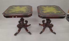 A pair of leather top side tables. Approximately 60 cm wide.