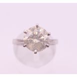 A platinum diamond solitaire ring. Diamond weight approximately 3 carats. Ring size K/L.