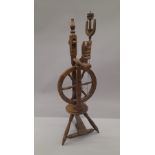 A spinning wheel. 105 cm high.