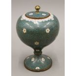 A 19th century Chinese cloisonne lidded urn. 19 cm high.