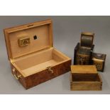 A humidor and two cigarette boxes. The former 37 cm wide.