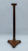 A mahogany torchere, and a lyre end single bed head and foot board. The former 150 cm high.