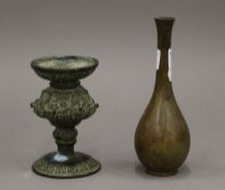 Two small bronze vases. The largest 16.5 cm high.