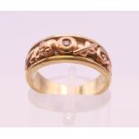 A 9 ct gold and diamond Clogau ring. Ring size J/K. 4.4 grammes total weight.