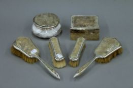 A silver and shagreen dressing table set.