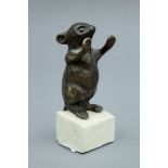 A bronze model of a mouse on a plinth base. 10 cm high.