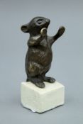 A bronze model of a mouse on a plinth base. 10 cm high.