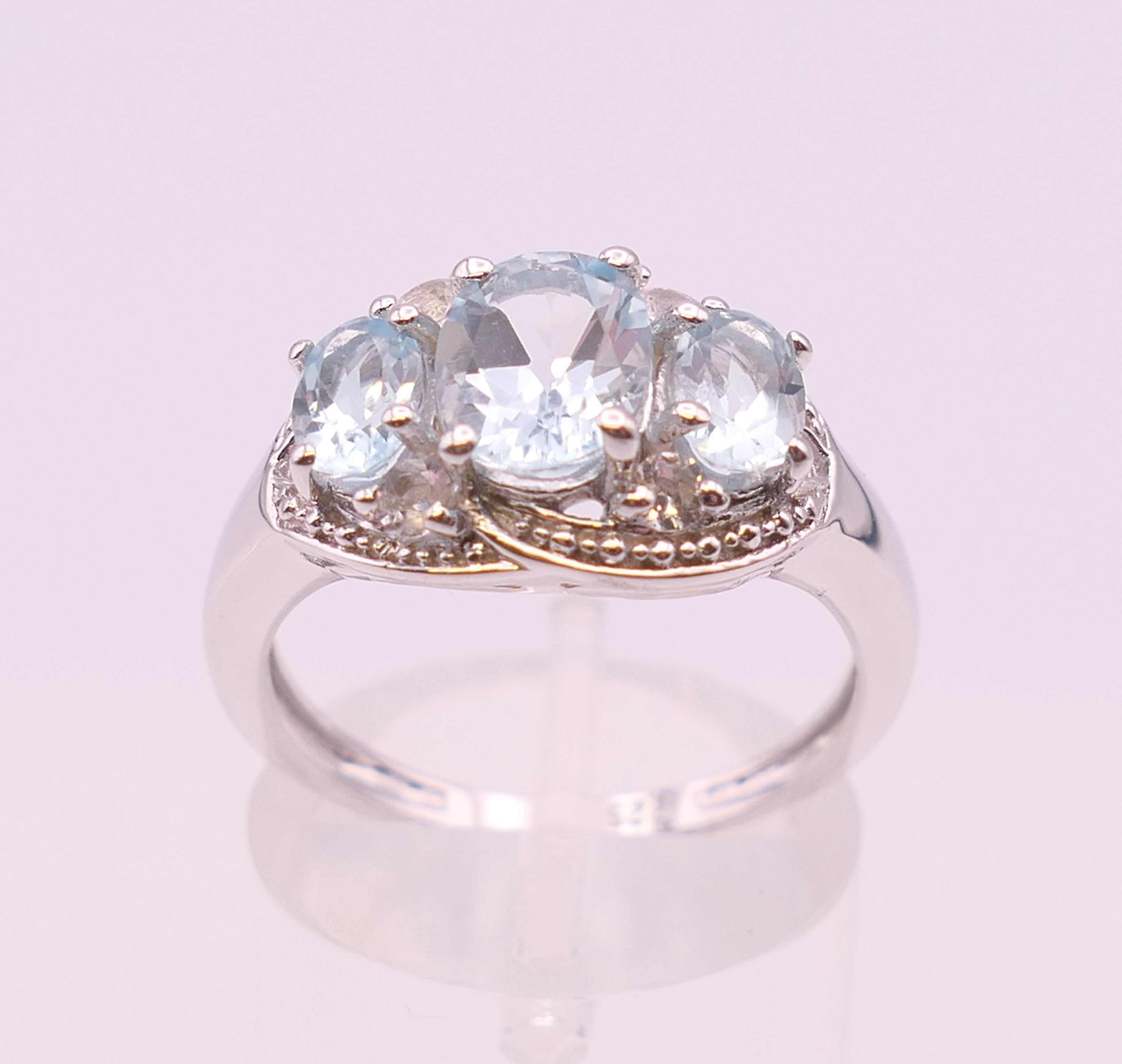 A silver dress ring. Ring size P.