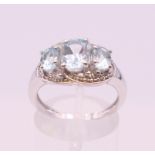 A silver dress ring. Ring size P.