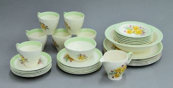 A florally decorated porcelain tea set.