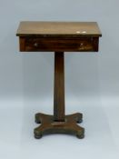 A 19th century rosewood single drawer side table. 51 cm wide.