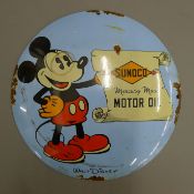 An enamel Micky Mouse sign. 29 cm diameter.