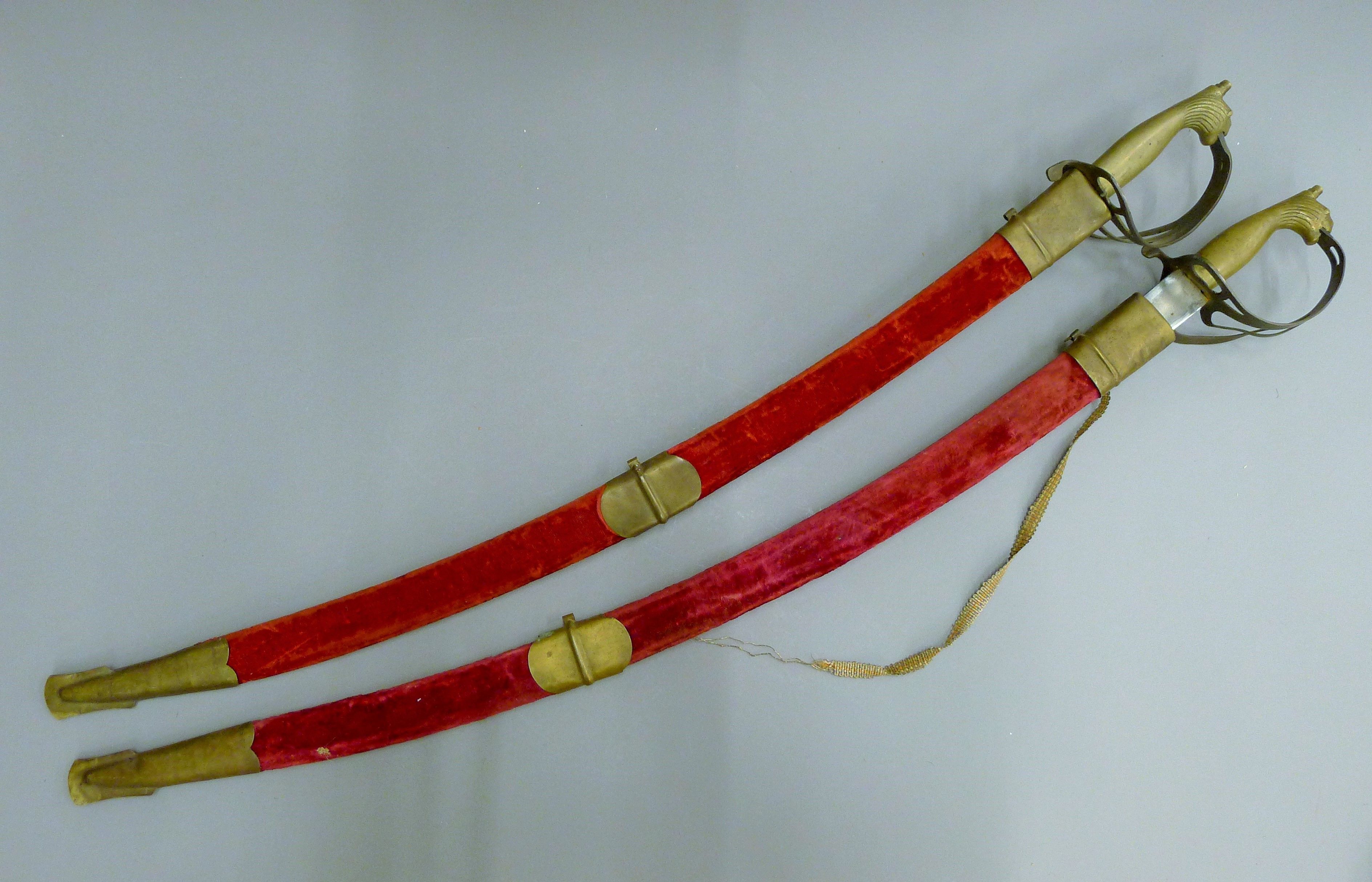 Two Indian ceremonial swords and scabbards. 89 cm long.