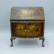 An antique brass studded leather covered bureau decorated hunting scenes. 99 cm wide.