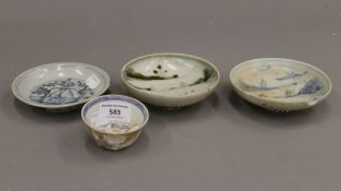 Four pieces of 18th century Chinese shipwreck cargo porcelain. The tea bowl 7 cm diameter.