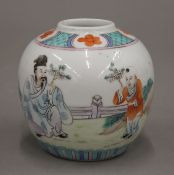 A 19th century Chinese porcelain ginger jar painted with a scholar and child,