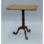 A 19th century mahogany tilt top tripod table. 65 cm long.