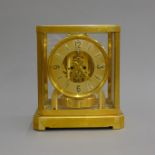 A Le Coultre Atmos clock. 23 cm high.