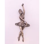 A silver ballerina form brooch. 7 cm high.