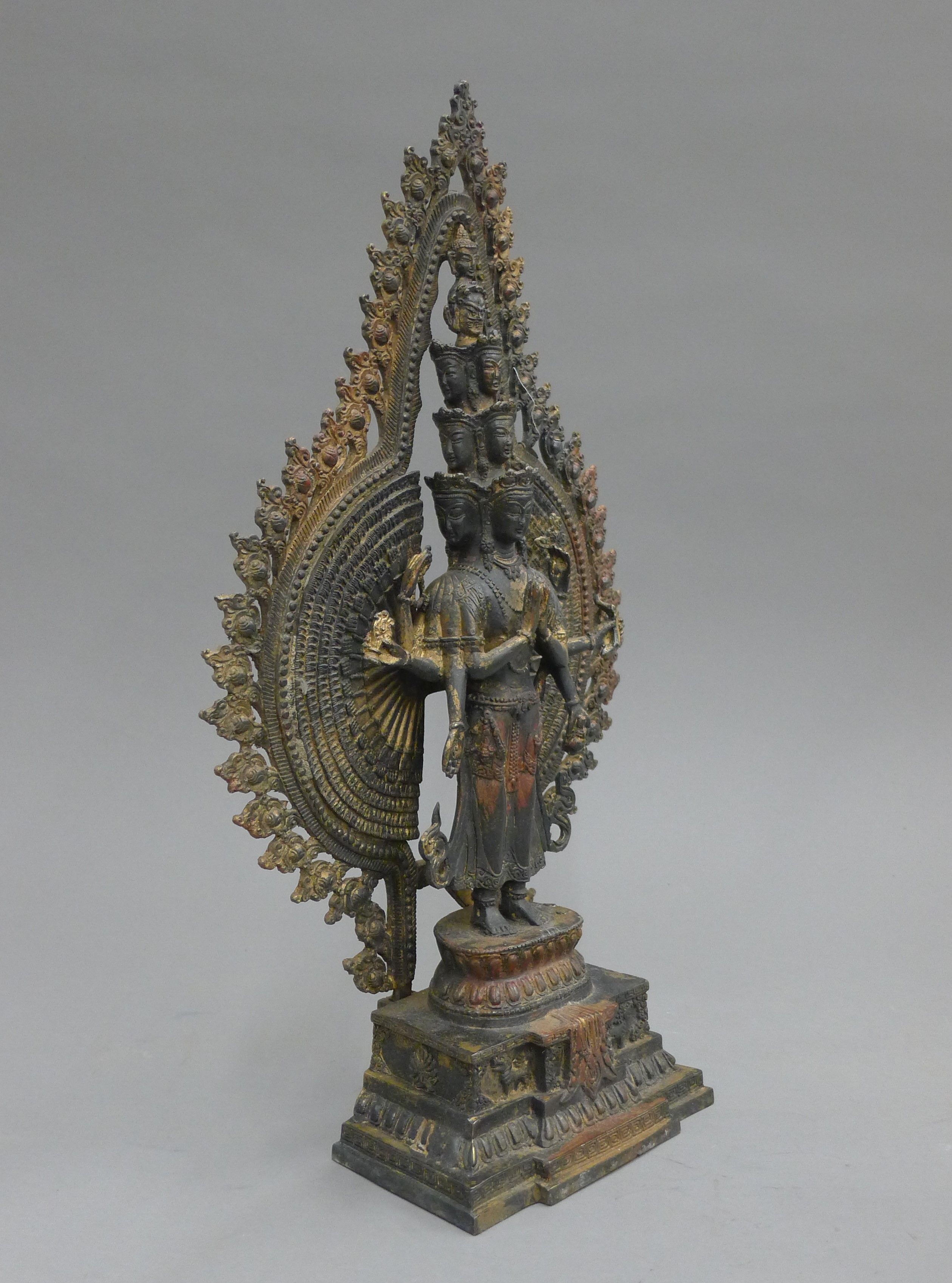 A bronze model of a multi-armed deity. 40.5 cm high. - Image 2 of 3