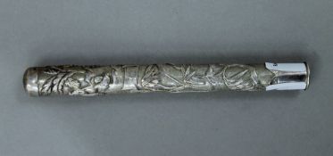 A Chinese unmarked silver parasol handle. 15 cm high.