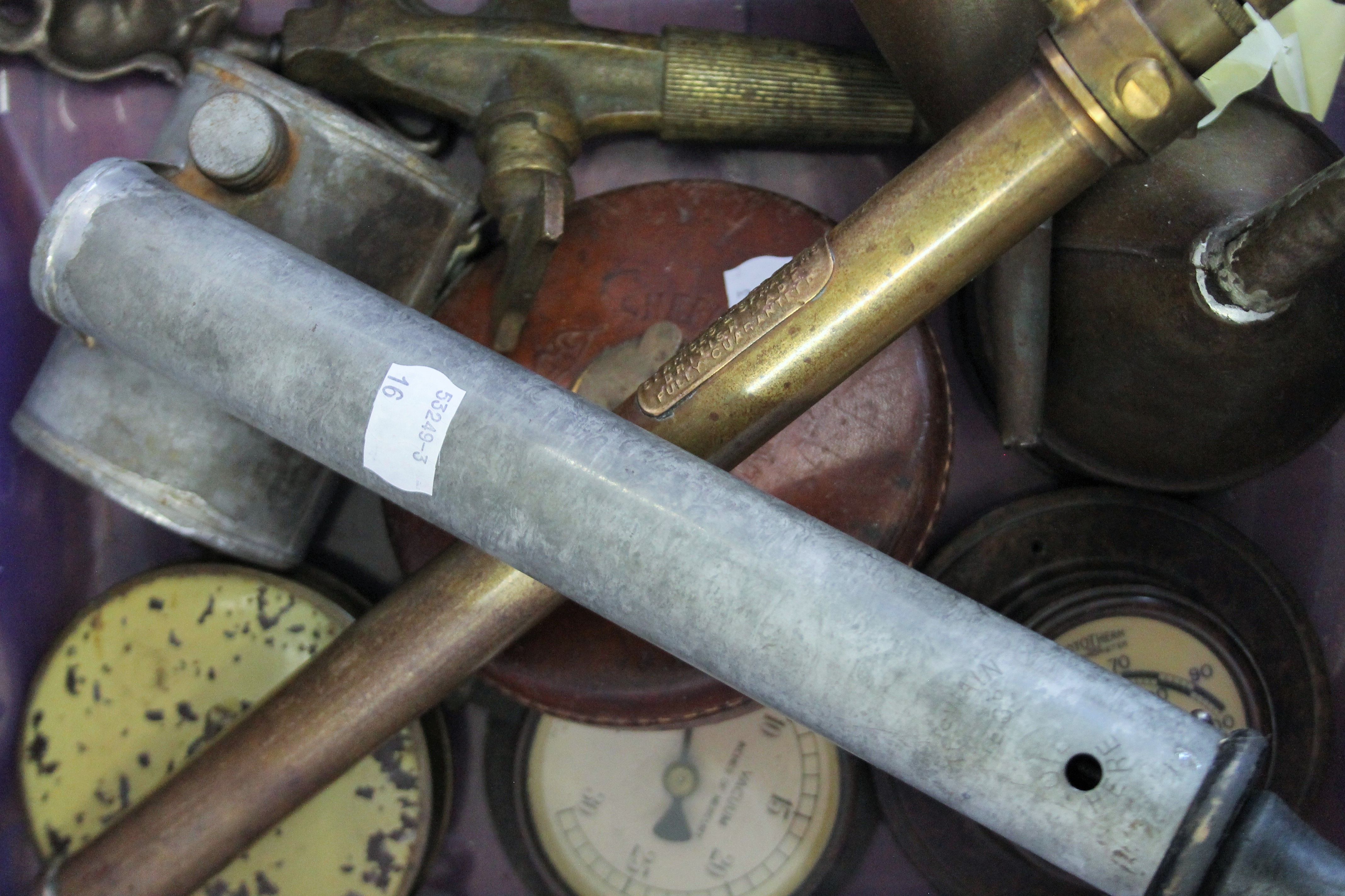 A box of tape measures, instruments, etc.