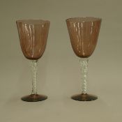 A large pair of amethyst and clear glass goblets. 33 cm high.