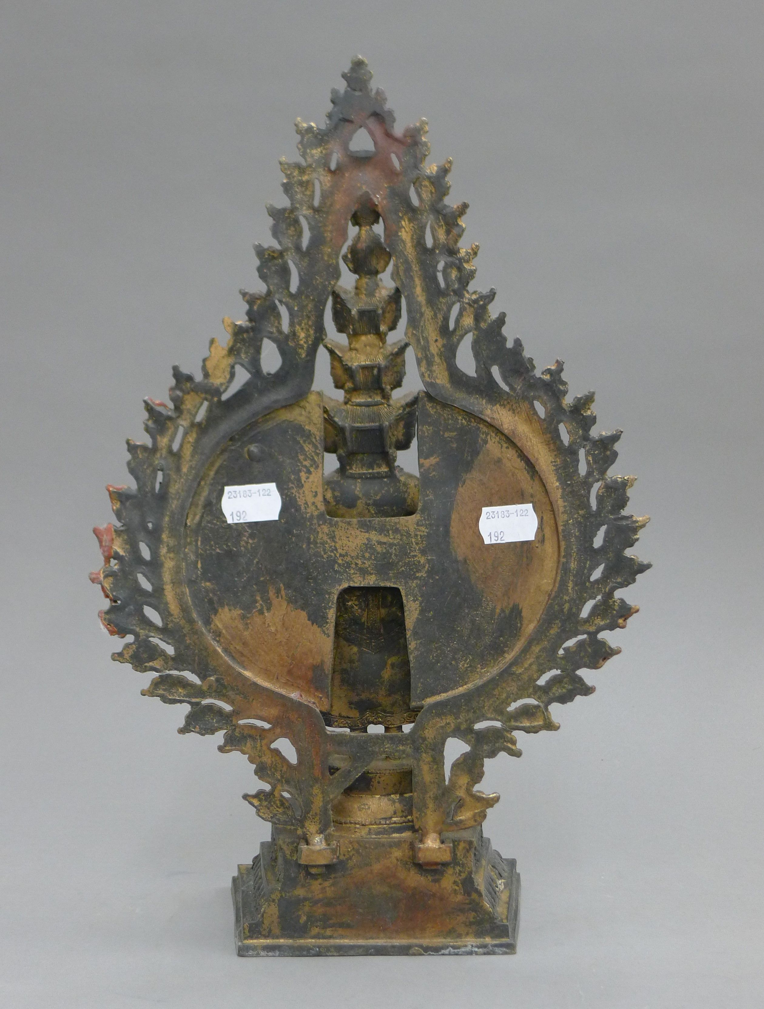 A bronze model of a multi-armed deity. 40.5 cm high. - Image 3 of 3