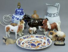 A box of porcelain animals and a box of decorative ceramics.