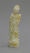 A Chinese white jade model of Guanyin. 19.5 cm high.