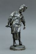 A Japanese silvered white metal model of a Geisha. 21 cm high.