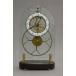 A skeleton clock. 37 cm high.