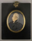 A miniature portrait of a 19th century gentleman, in an ebonised frame. 10.5 x 13 cm.