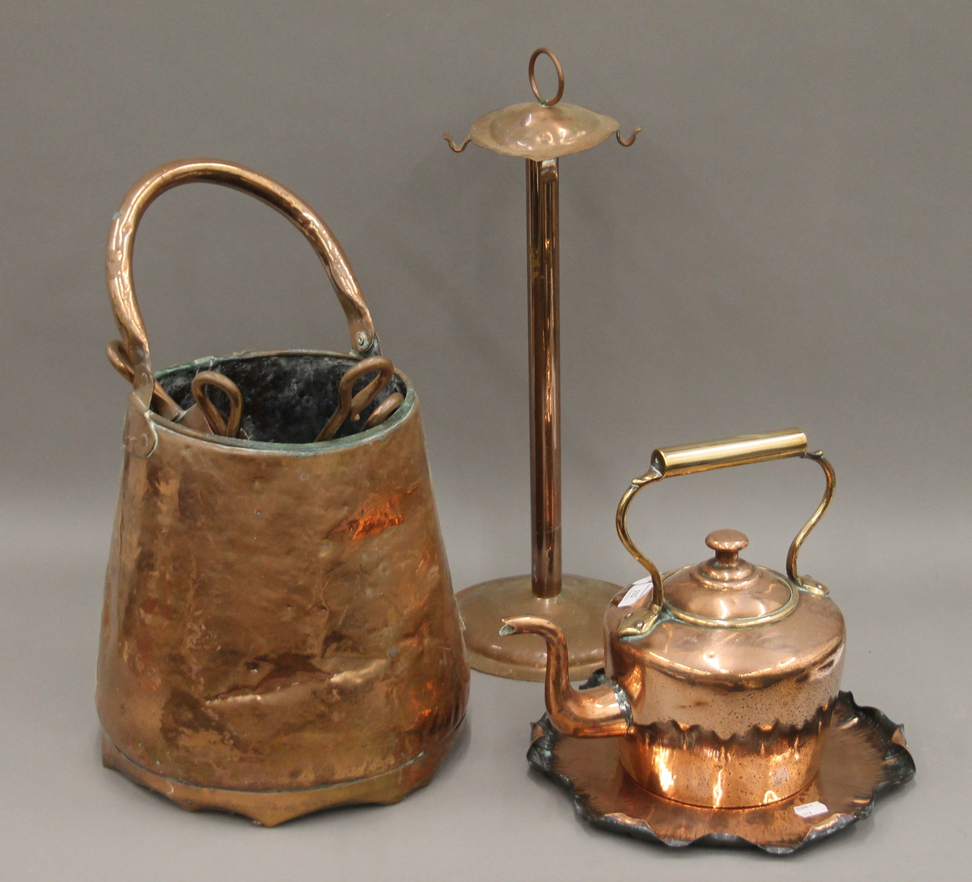 A quantity of various copper ware.