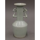 A celadon vase. 20.5 cm high.