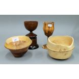 Two treen cups and two treen bowls. The largest 16.5 cm high.