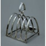 A silver toast rack. 8 cm wide. 94 grammes.