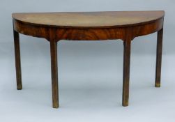 A 19th century mahogany d-end table. 137 cm wide.