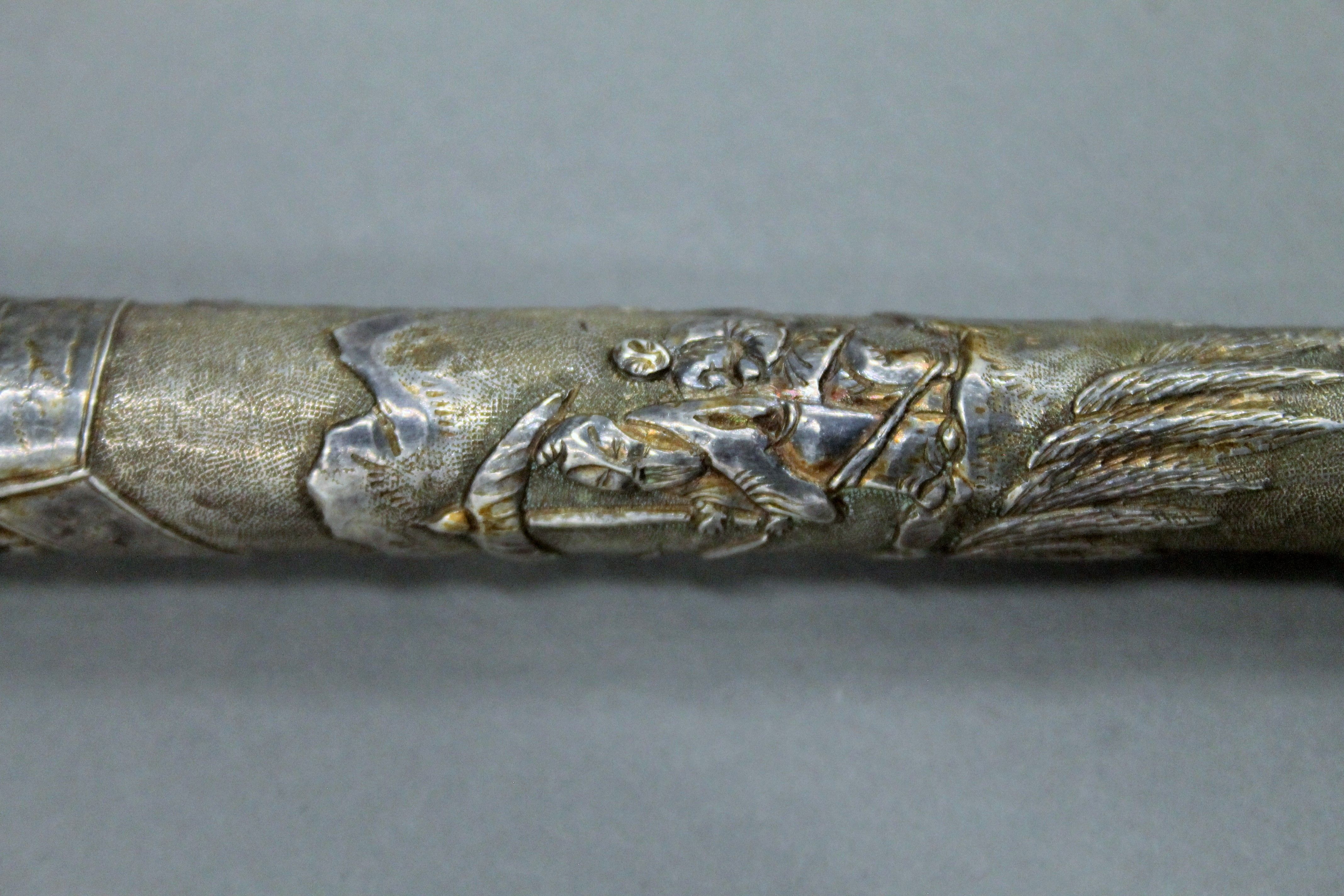 A Chinese unmarked silver parasol handle. 15 cm high. - Image 3 of 3