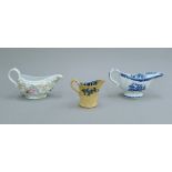 Two 18th century porcelain sauce boats and a jug.