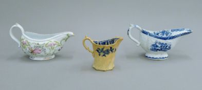 Two 18th century porcelain sauce boats and a jug.