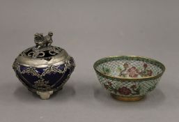 A Chinese plique a jour glass bowl, and a white metal mounted lidded jar. The former 9.